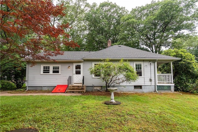 3442 Flat River Rd, Coventry, RI 02816 - view of front of house with entry steps, a front lawn, a chimney, and a shingled roof