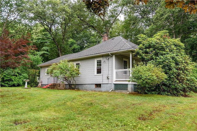 3442 Flat River Rd, Coventry, RI 02816 - view of side of home featuring a yard, a chimney, and a porch