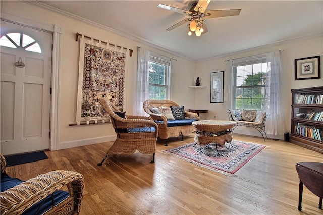 46 Highland Ave, Westerly, RI 02891 - living area with ornamental molding, light wood-style floors, and a ceiling fan