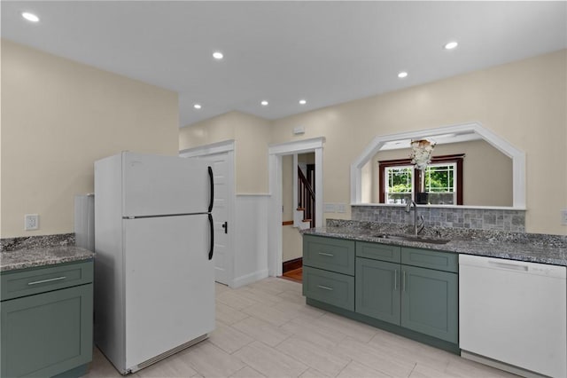 8 Parkman St, Providence, RI 02907 - kitchen with white appliances, green cabinetry, backsplash, recessed lighting, and stone counters