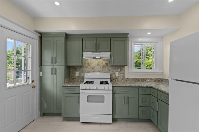 8 Parkman St, Providence, RI 02907 - kitchen featuring green cabinets, white appliances, under cabinet range hood, plenty of natural light, and recessed lighting