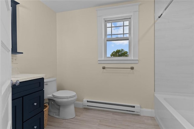 8 Parkman St, Providence, RI 02907 - full bathroom with baseboard heating, vanity, wood finished floors, and shower / tub combination
