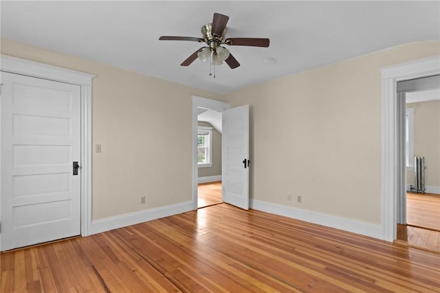 8 Parkman St, Providence, RI 02907 - unfurnished room featuring light wood-style flooring and a ceiling fan