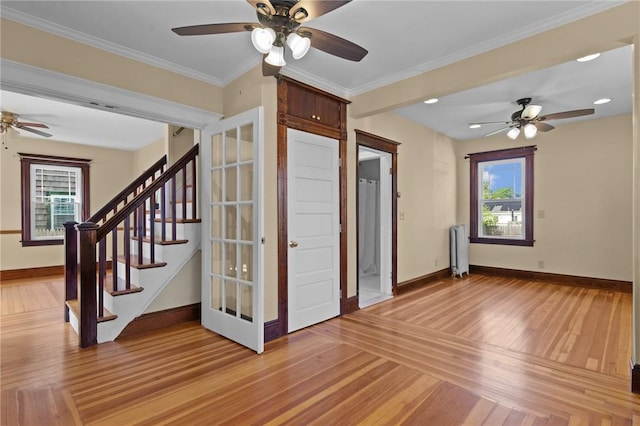 8 Parkman St, Providence, RI 02907 - spare room featuring radiator, a ceiling fan, plenty of natural light, recessed lighting, and crown molding