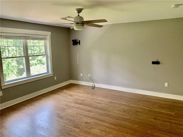 724 Centerville Rd Unit 6, Warwick, RI 02886 - unfurnished room with wood finished floors, a smoke detector, and ceiling fan