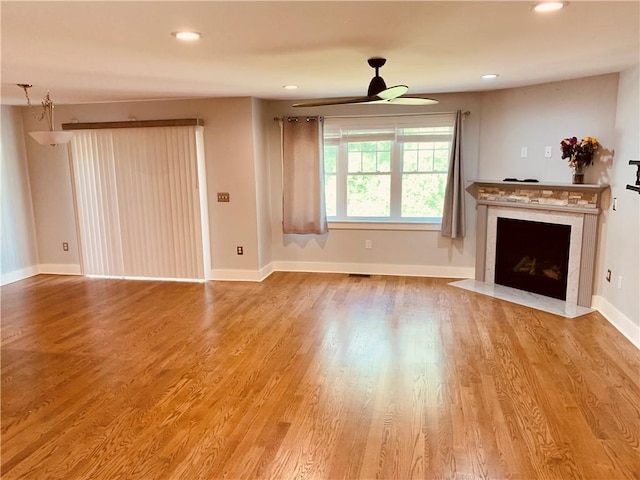 724 Centerville Rd Unit 6, Warwick, RI 02886 - unfurnished living room with ceiling fan, wood finished floors, a fireplace with flush hearth, and recessed lighting