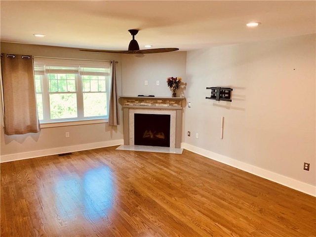 724 Centerville Rd Unit 6, Warwick, RI 02886 - unfurnished living room with a fireplace, wood finished floors, a ceiling fan, and recessed lighting