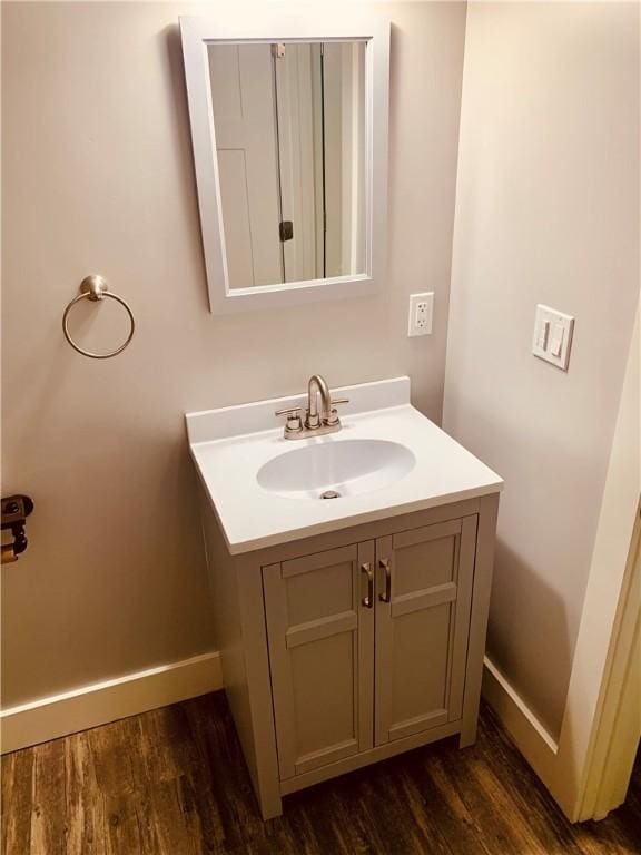 724 Centerville Rd Unit 6, Warwick, RI 02886 - bathroom featuring wood finished floors and vanity