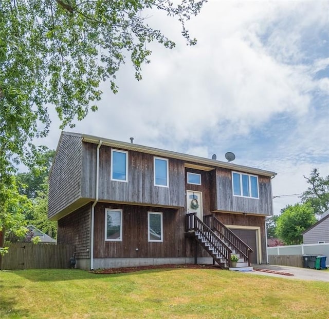 36 Wadsworth St, Warwick, RI 02889 - raised ranch with driveway and an attached garage