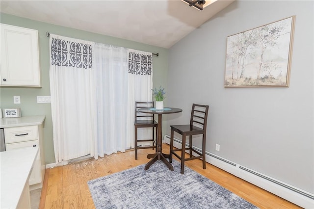 36 Wadsworth St, Warwick, RI 02889 - dining room with baseboard heating and light wood-type flooring