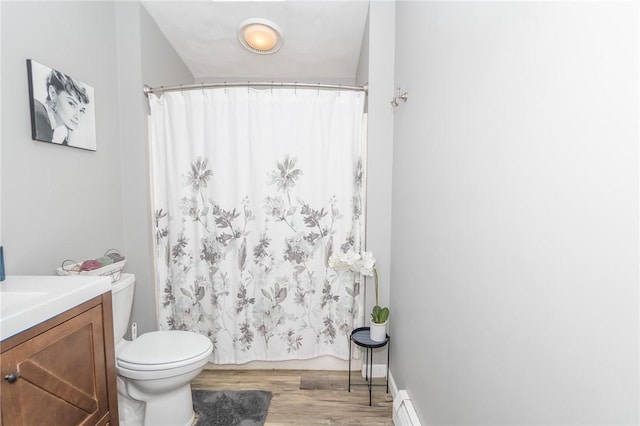 36 Wadsworth St, Warwick, RI 02889 - full bath featuring vanity, wood finished floors, and a shower with shower curtain
