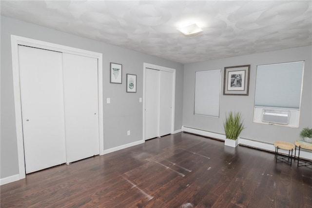 36 Wadsworth St, Warwick, RI 02889 - unfurnished bedroom with two closets, cooling unit, and wood finished floors