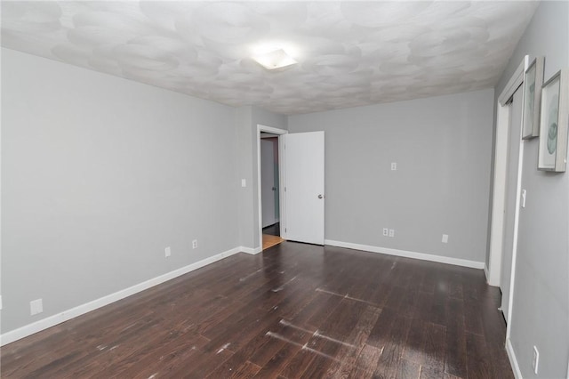 36 Wadsworth St, Warwick, RI 02889 - spare room featuring dark wood-style flooring and baseboards