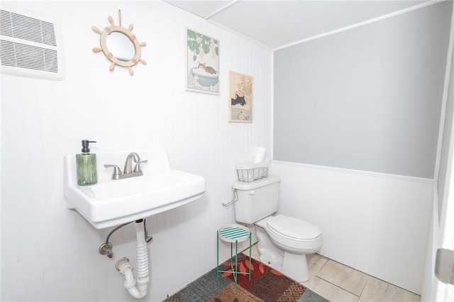 36 Wadsworth St, Warwick, RI 02889 - half bath with toilet and tile patterned floors