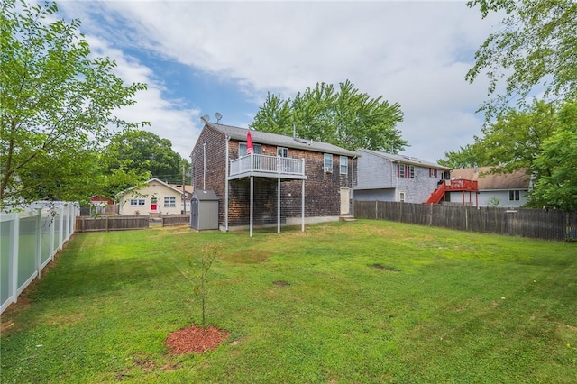 36 Wadsworth St, Warwick, RI 02889 - rear view of house with a storage shed and a fenced backyard