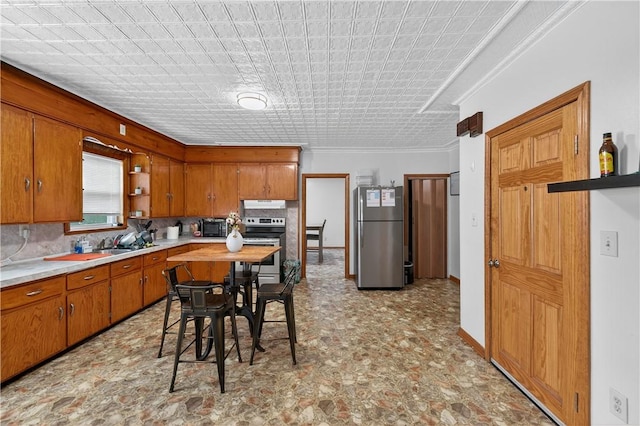 270 Central St, Central Falls, RI 02863 - kitchen with appliances with stainless steel finishes, brown cabinetry, open shelves, ornamental molding, and decorative backsplash