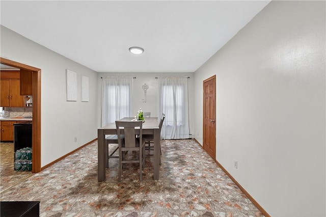270 Central St, Central Falls, RI 02863 - dining space with baseboards