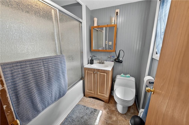 270 Central St, Central Falls, RI 02863 - bathroom featuring shower / bath combination with glass door, vanity, and tile patterned floors