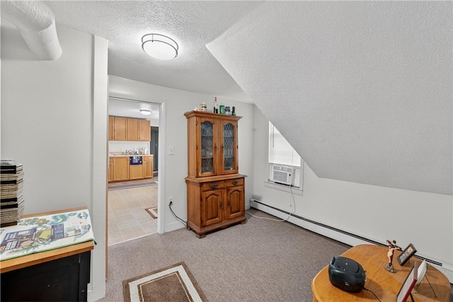 270 Central St, Central Falls, RI 02863 - living area with a textured ceiling, cooling unit, light carpet, and a baseboard radiator