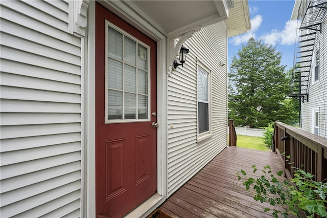 79 Winthrop St, Woonsocket, RI 02895 - doorway to property featuring a wooden deck