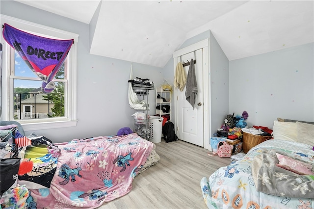 79 Winthrop St, Woonsocket, RI 02895 - bedroom featuring wood finished floors and lofted ceiling