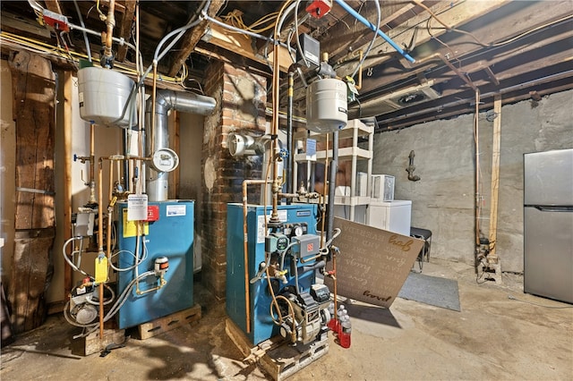79 Winthrop St, Woonsocket, RI 02895 - utility room featuring washer / dryer and a heating unit