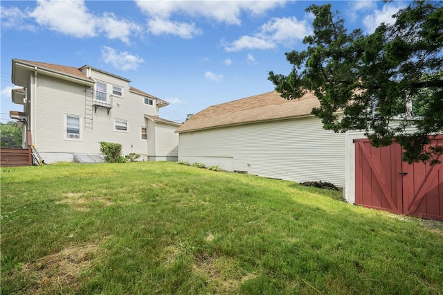 79 Winthrop St, Woonsocket, RI 02895 - back of house featuring a yard and an outdoor structure