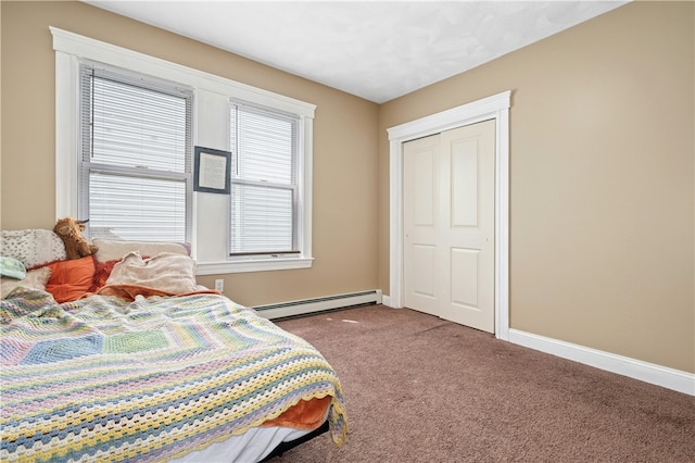 79 Winthrop St, Woonsocket, RI 02895 - bedroom with baseboard heating, carpet, and a closet