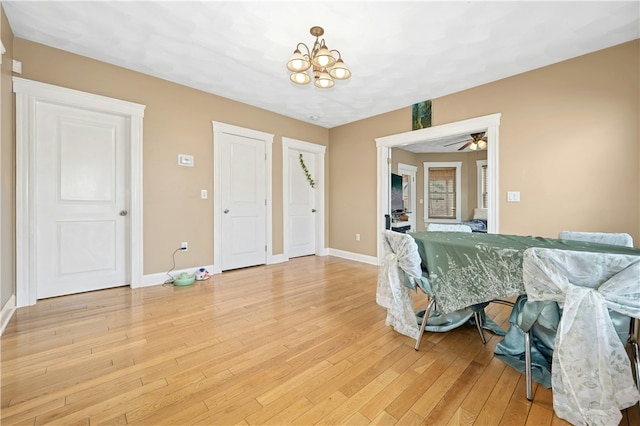 79 Winthrop St, Woonsocket, RI 02895 - entryway with light wood-type flooring and a chandelier