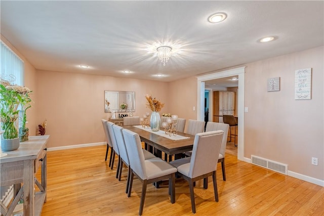 6 Jacksonia Dr, North Providence, RI 02911 - dining room featuring light wood-style floors, a chandelier, and recessed lighting