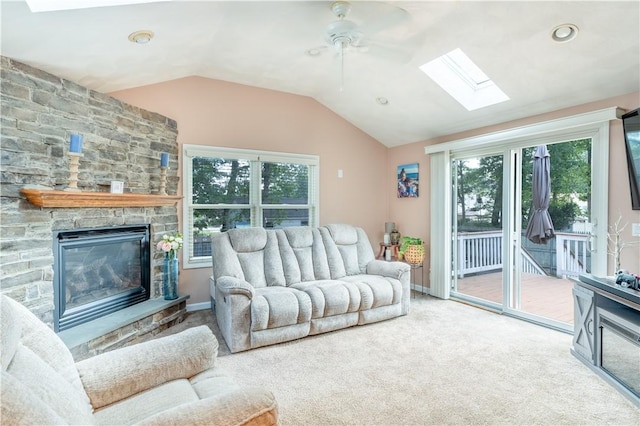 6 Jacksonia Dr, North Providence, RI 02911 - living room featuring a skylight, ceiling fan, vaulted ceiling, plenty of natural light, and carpet floors
