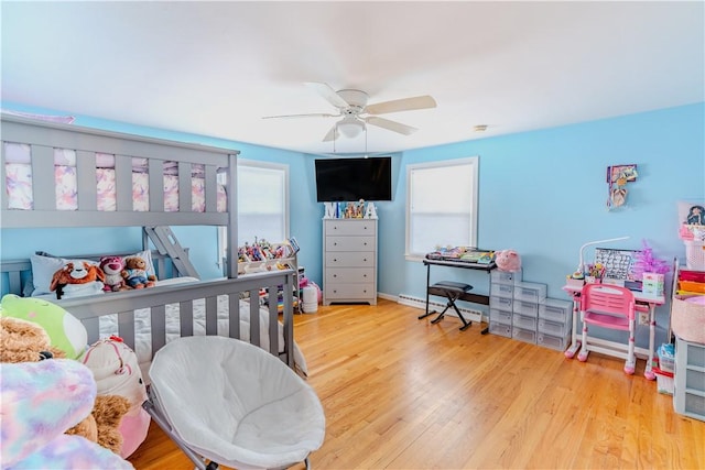 6 Jacksonia Dr, North Providence, RI 02911 - bedroom featuring wood finished floors, baseboard heating, and a ceiling fan