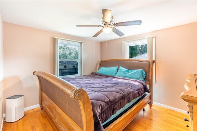 6 Jacksonia Dr, North Providence, RI 02911 - bedroom with multiple windows, light wood-style flooring, and ceiling fan