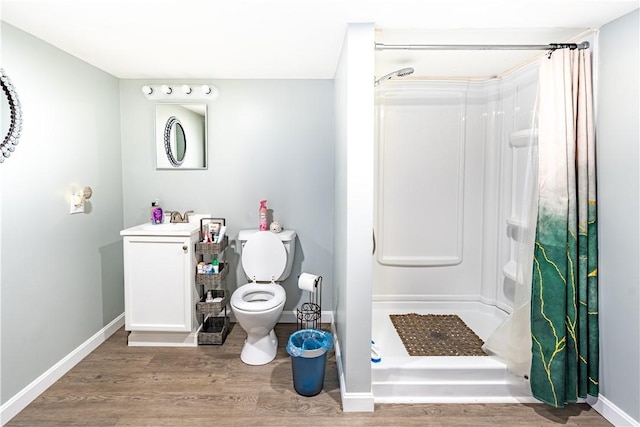 6 Jacksonia Dr, North Providence, RI 02911 - bathroom with wood finished floors, a stall shower, and vanity