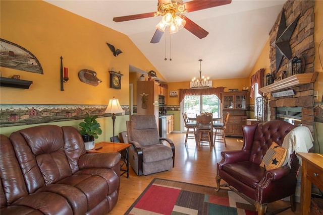 350 Narrow Ln, Charlestown, RI 02813 - living room with ceiling fan, lofted ceiling, light wood-type flooring, a chandelier, and a stone fireplace