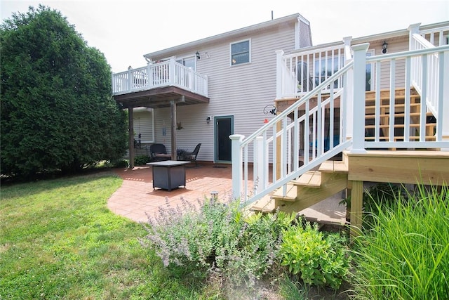 350 Narrow Ln, Charlestown, RI 02813 - back of house featuring a patio, stairs, a fire pit, and a lawn