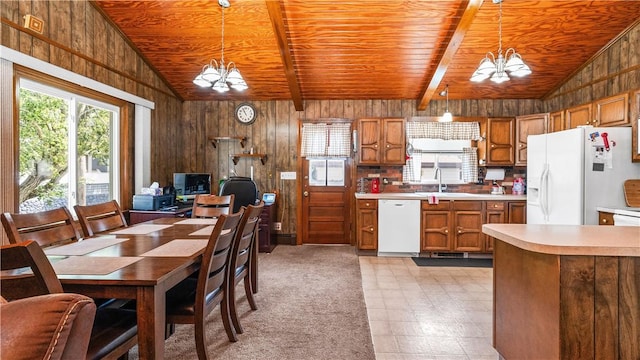 50 Tobey St, Providence, RI 02909 - kitchen featuring a chandelier, white appliances, wood ceiling, light countertops, and wooden walls