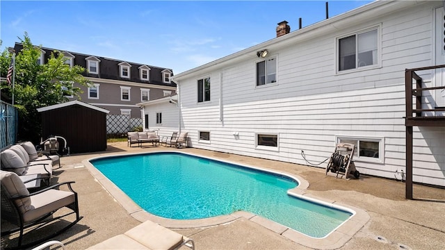 50 Tobey St, Providence, RI 02909 - view of swimming pool with a patio area, a storage unit, and an outdoor hangout area