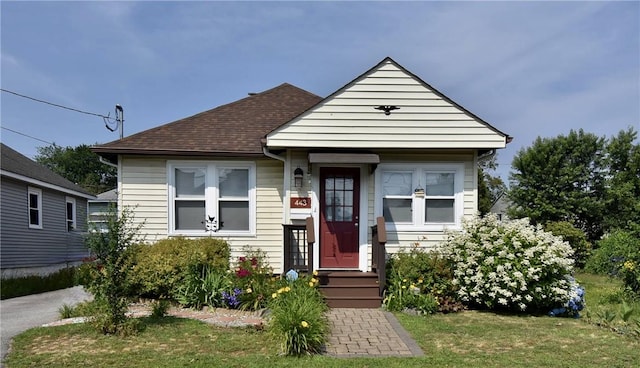 443 Harrington Ave, Warwick, RI 02888 - view of front of house with roof with shingles