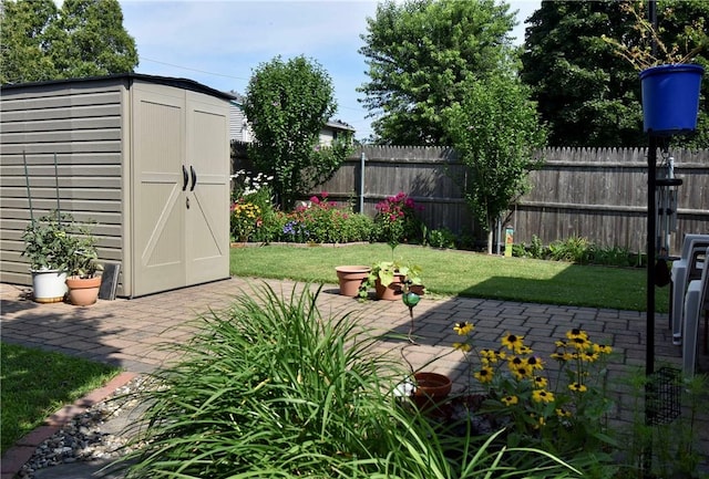 443 Harrington Ave, Warwick, RI 02888 - view of yard featuring a storage unit and a patio area