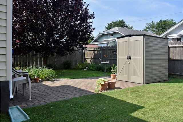 443 Harrington Ave, Warwick, RI 02888 - fenced backyard featuring a shed and a patio area