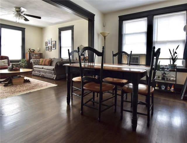 443 Harrington Ave, Warwick, RI 02888 - dining area featuring dark wood-style floors, ceiling fan, and cooling unit