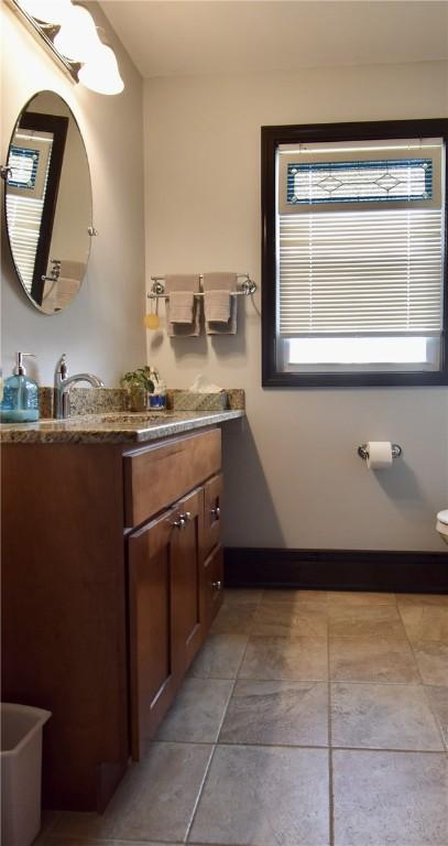 443 Harrington Ave, Warwick, RI 02888 - bathroom with vanity and toilet