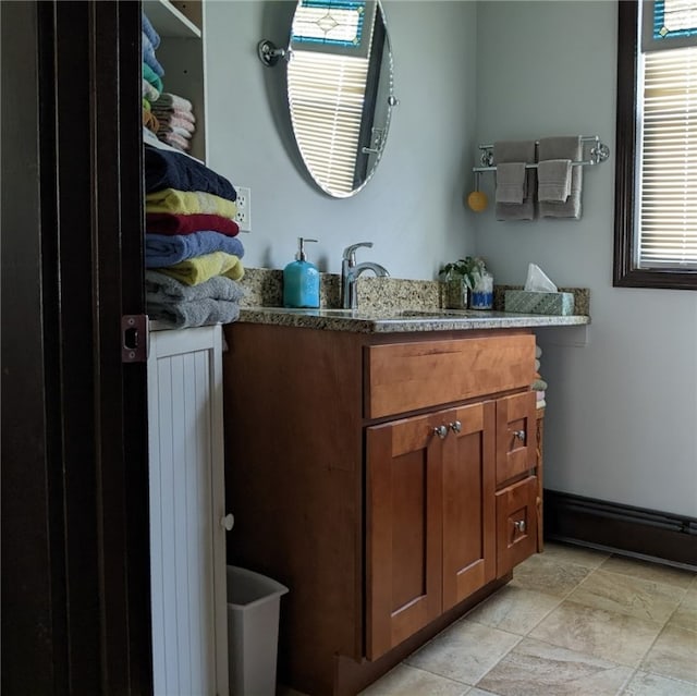 443 Harrington Ave, Warwick, RI 02888 - bathroom with vanity and stone finish flooring