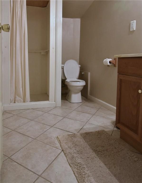 443 Harrington Ave, Warwick, RI 02888 - bathroom with tile patterned floors, a shower stall, and vanity