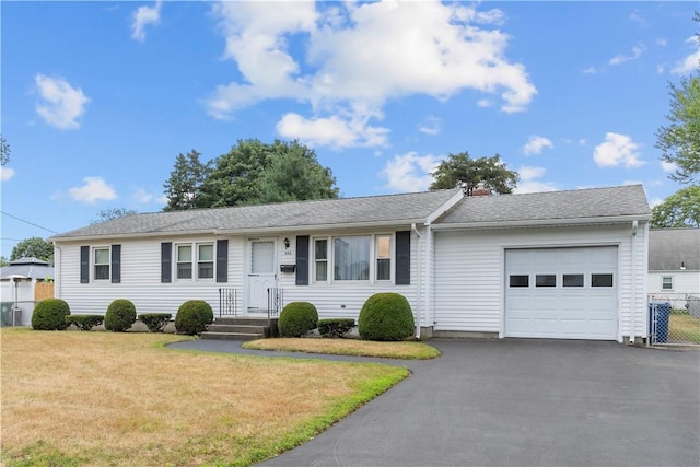 352 Cove Ave, Warwick, RI 02886 - ranch-style house with a garage and driveway