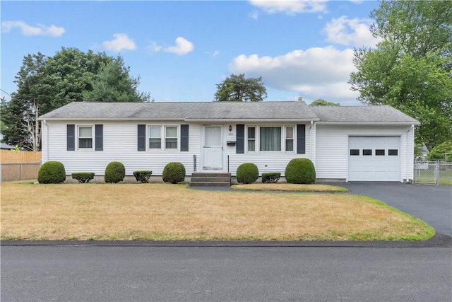 352 Cove Ave, Warwick, RI 02886 - ranch-style home featuring an attached garage and asphalt driveway