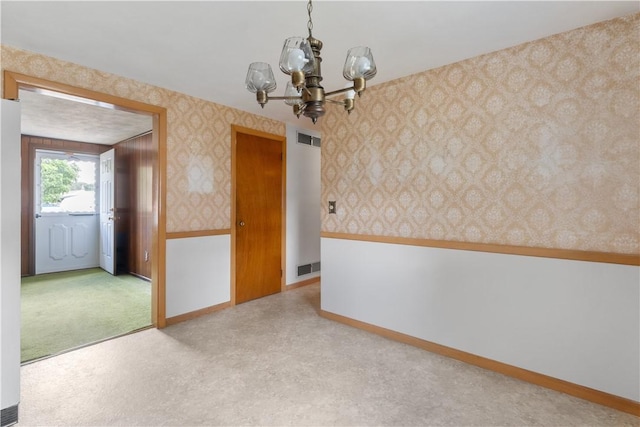 352 Cove Ave, Warwick, RI 02886 - unfurnished room with wallpapered walls and a chandelier