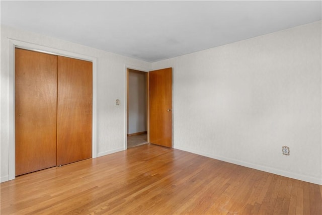352 Cove Ave, Warwick, RI 02886 - unfurnished bedroom featuring light wood-style floors and a closet
