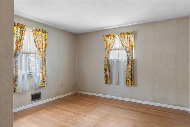 352 Cove Ave, Warwick, RI 02886 - unfurnished room with wood finished floors and baseboards